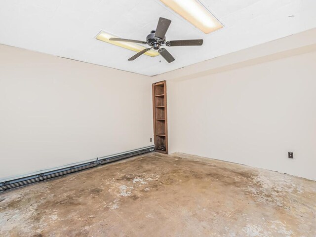 1313 Kearney Ave, Bronx, NY 10465 - unfurnished room featuring unfinished concrete floors, a baseboard radiator, and ceiling fan