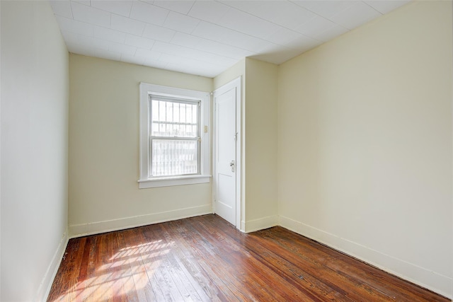 32-55 54th St, Woodside, NY 11377 - unfurnished room featuring dark wood-style flooring and baseboards