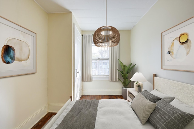 32-55 54th St, Woodside, NY 11377 - bedroom with dark wood-style flooring and baseboards