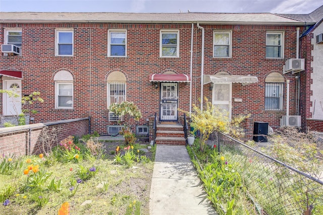 32-55 54th St, Woodside, NY 11377 - view of front of home with brick siding and cooling unit