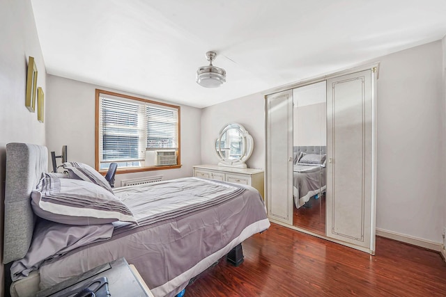 926 Van Nest Ave, Bronx, NY 10462 - bedroom featuring a closet, wood finished floors, and cooling unit