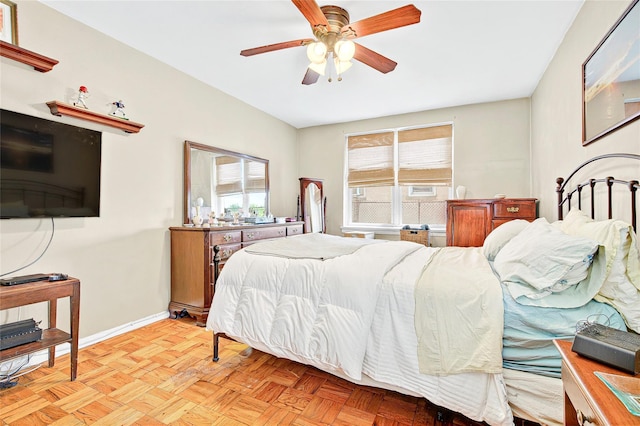 bedroom with baseboards and ceiling fan
