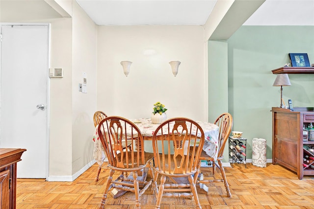 dining space with baseboards