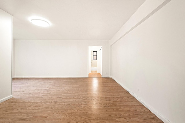 105-15 66th Rd St Unit 4E, Forest Hills, NY 11375 - empty room with baseboards and wood finished floors