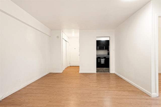 105-15 66th Rd St Unit 4E, Forest Hills, NY 11375 - spare room featuring baseboards and light wood-type flooring