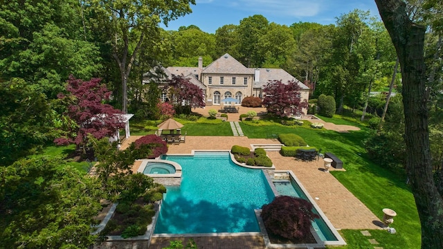 3 Pin Oak Ct, Old Brookville, NY 11545 - back of house with a gazebo, a patio, a yard, and a pool with connected hot tub