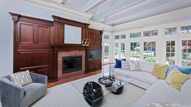 3 Pin Oak Ct, Old Brookville, NY 11545 - living room featuring a fireplace, beamed ceiling, and french doors