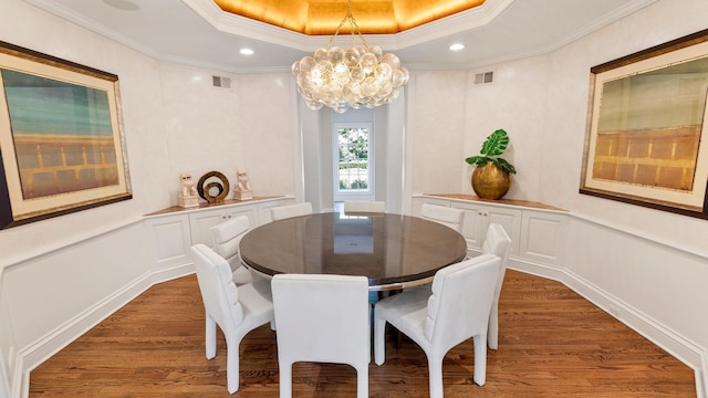 3 Pin Oak Ct, Old Brookville, NY 11545 - dining room featuring wood finished floors, a chandelier, crown molding, recessed lighting, and a raised ceiling