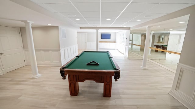 3 Pin Oak Ct, Old Brookville, NY 11545 - playroom with a paneled ceiling, ornate columns, light wood-style flooring, a wainscoted wall, and billiards