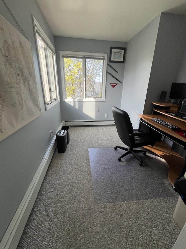 office with a baseboard radiator, carpet floors, and baseboards