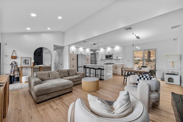 18 Mcbride Pl, Goshen, NY 10924 - living area with light wood-type flooring, recessed lighting, and lofted ceiling