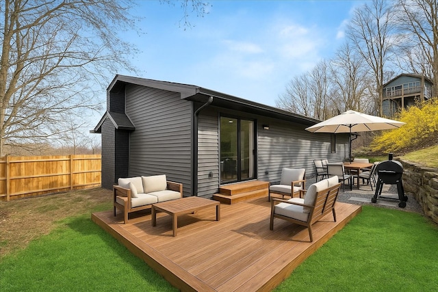 18 Mcbride Pl, Goshen, NY 10924 - rear view of house with a wooden deck, outdoor lounge area, and outdoor dining area