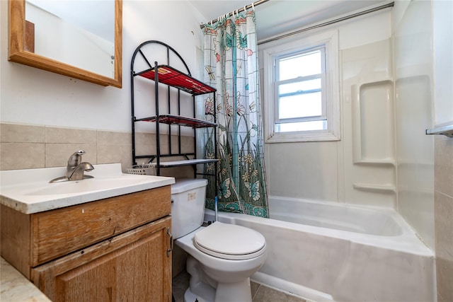full bath featuring toilet, shower / bath combination with curtain, and vanity