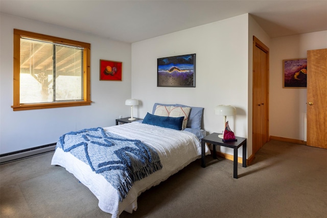 bedroom featuring baseboards, carpet flooring, and a baseboard radiator