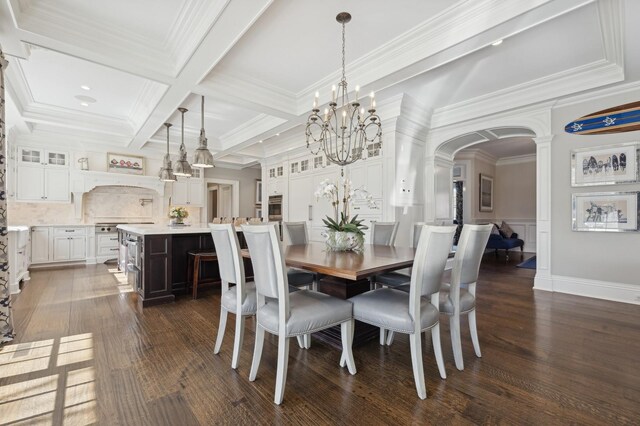 dining space featuring a chandelier, arched walkways, ornamental molding, beam ceiling, and dark wood-style floors