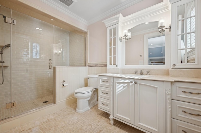 full bathroom with crown molding, a stall shower, vanity, toilet, and visible vents
