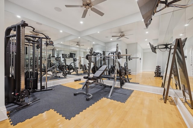 exercise room featuring recessed lighting, wood finished floors, a ceiling fan, and baseboards