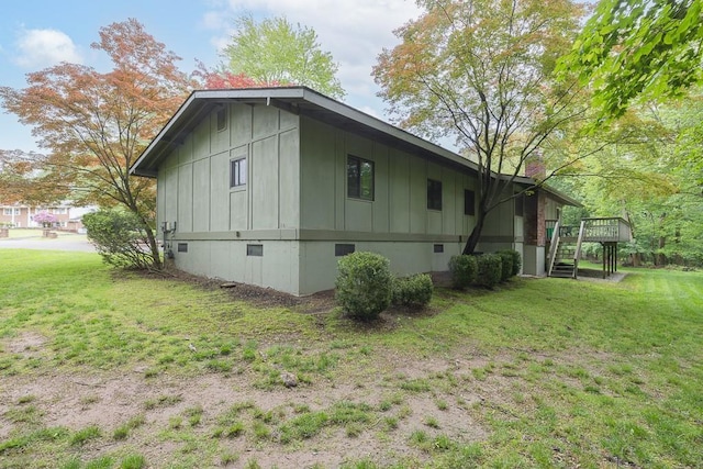 14 Wesley Ct, Congers, NY 10920 - view of side of home featuring board and batten siding, a deck, crawl space, a yard, and a chimney