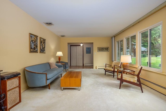 14 Wesley Ct, Congers, NY 10920 - living area featuring a baseboard heating unit, carpet, and baseboard heating