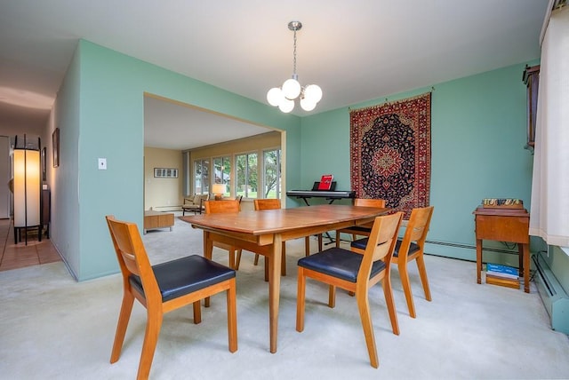 14 Wesley Ct, Congers, NY 10920 - dining area with a chandelier, a baseboard heating unit, and light colored carpet