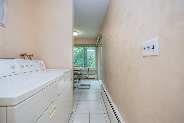 14 Wesley Ct, Congers, NY 10920 - washroom featuring separate washer and dryer, a baseboard radiator, and light tile patterned floors
