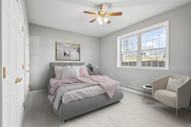 12 Hill Rd, Washingtonville, NY 10992 - carpeted bedroom with baseboards, a baseboard heating unit, and ceiling fan