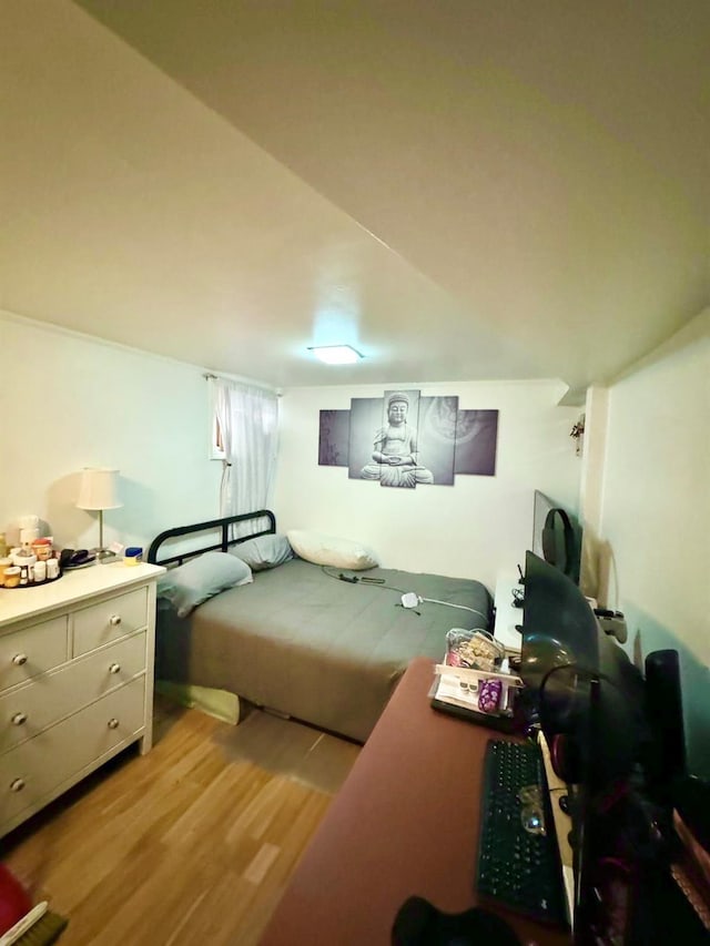 bedroom featuring light wood-type flooring