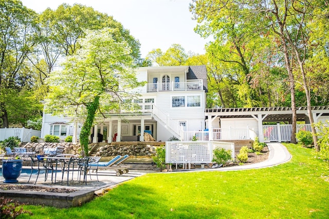 2 Spring Hollow Rd, Centerport, NY 11721 - back of house with a patio, stairs, and a balcony