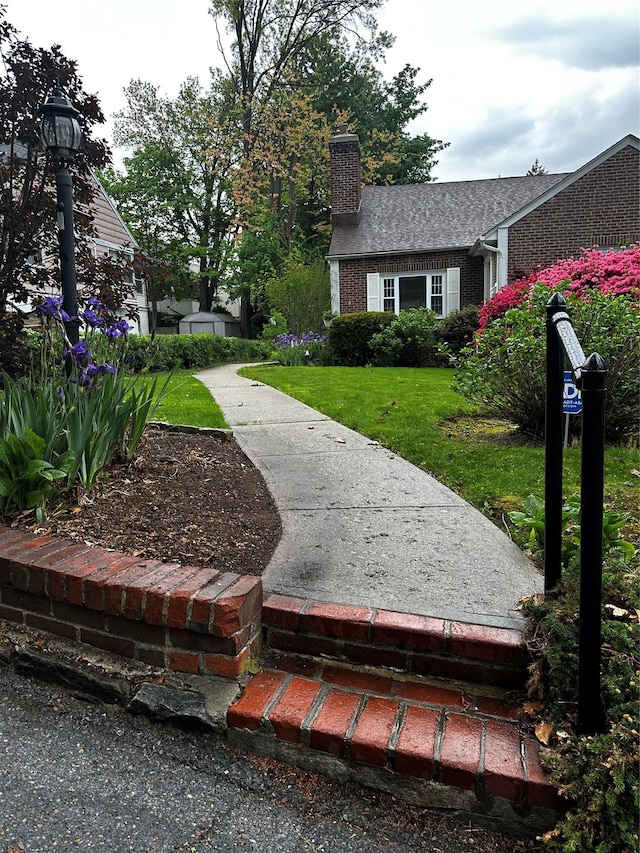 surrounding community with a yard
