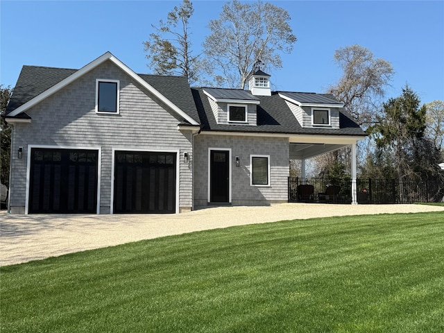 view of front of home with a garage, a front lawn, fence, roof with shingles, and driveway