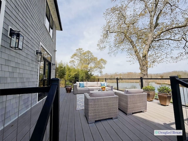 wooden deck with an outdoor living space