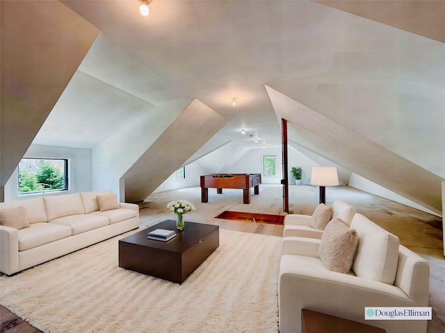 living room with lofted ceiling