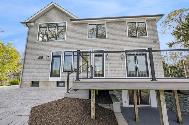 back of property featuring a patio