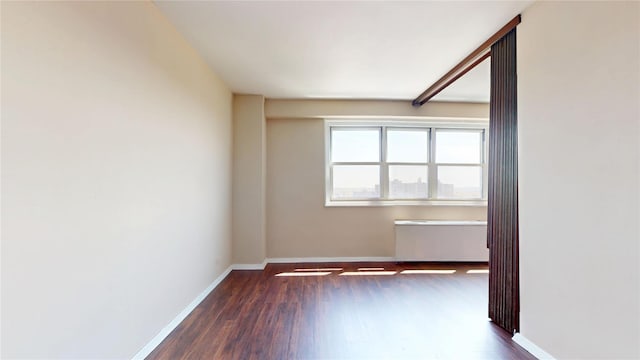 66-36 Yellowstone Blvd Unit 21C, Forest Hills, NY 11375 - empty room featuring baseboards and wood finished floors