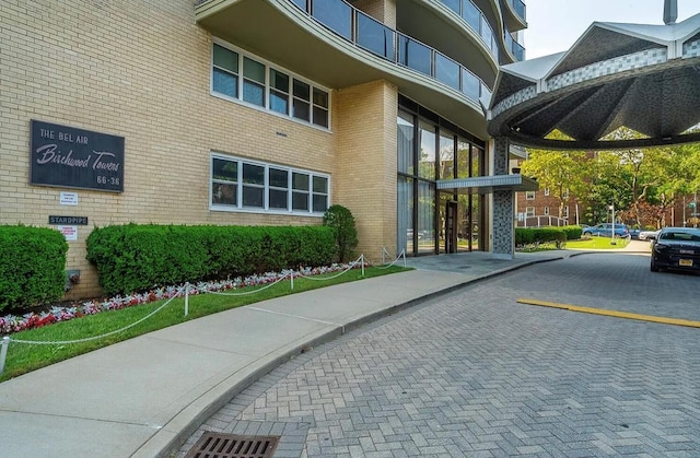 66-36 Yellowstone Blvd Unit 21C, Forest Hills, NY 11375 - view of property featuring uncovered parking