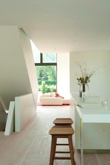interior space with floor to ceiling windows and wood finished floors