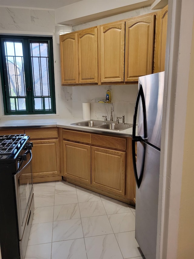 1503 Metropolitan Ave Unit 2F, Bronx, NY 10462 - kitchen with marble finish floor, appliances with stainless steel finishes, a sink, and light countertops