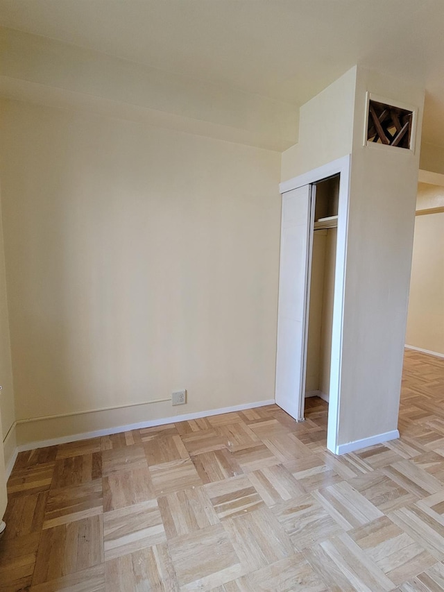 1503 Metropolitan Ave Unit 2F, Bronx, NY 10462 - unfurnished bedroom with baseboards and a closet
