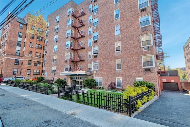 view of property with fence