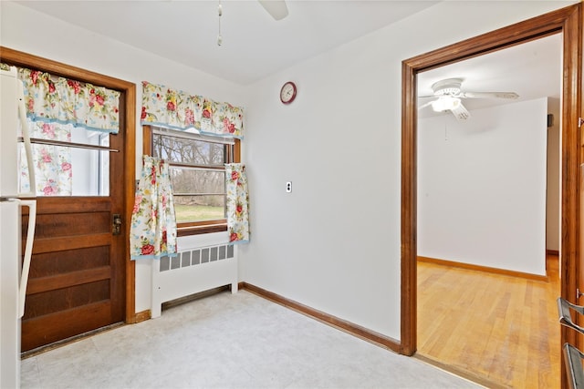 12 Brundage St, Armonk, NY 10504 - interior space featuring baseboards, ceiling fan, and radiator heating unit