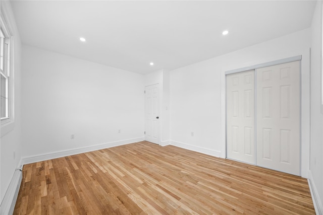 338 Rte 211 W, Middletown, NY 10940 - unfurnished bedroom with recessed lighting, a baseboard radiator, light wood-style floors, a closet, and baseboards