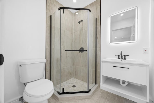 338 Rte 211 W, Middletown, NY 10940 - bathroom featuring recessed lighting, toilet, vanity, baseboards, and a stall shower