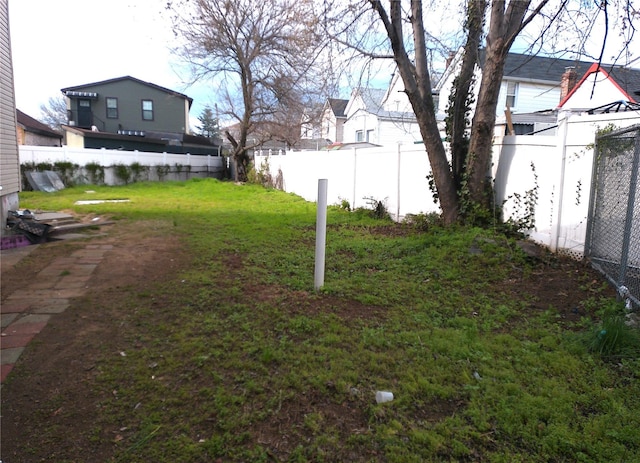 16739 147th Ave, Springfield Gardens, NY 11434 - view of yard with a fenced backyard and a residential view