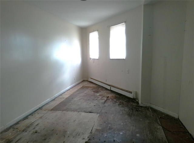 16739 147th Ave, Springfield Gardens, NY 11434 - empty room featuring a baseboard heating unit and baseboards