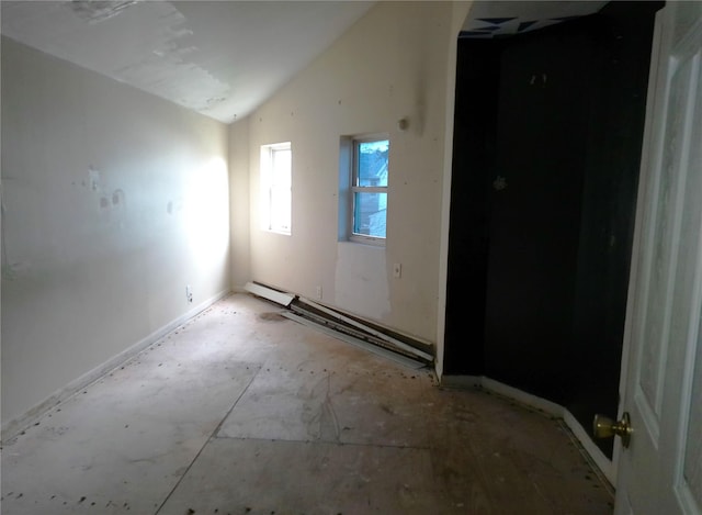 16739 147th Ave, Springfield Gardens, NY 11434 - spare room with baseboard heating and lofted ceiling