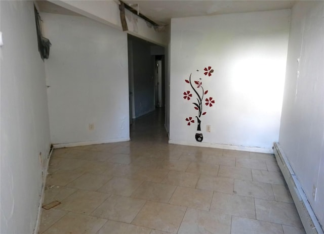 16739 147th Ave, Springfield Gardens, NY 11434 - unfurnished room with light floors and a baseboard radiator
