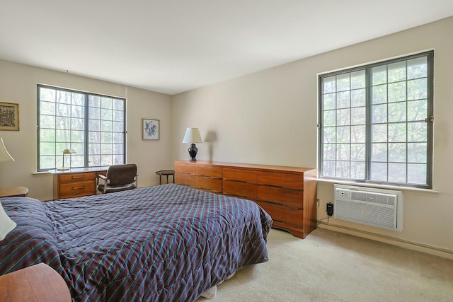 bedroom featuring light colored carpet and a wall mounted AC