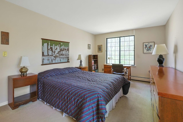 bedroom featuring baseboards, carpet, and a baseboard radiator
