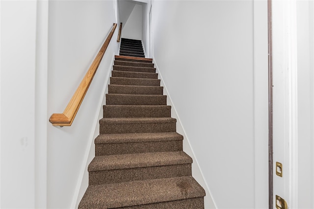 stairway with baseboards
