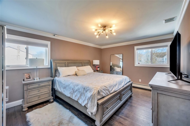 bedroom with dark wood-style flooring, a baseboard heating unit, a chandelier, and multiple windows